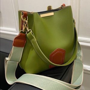 Brand new. Olive green and brown handbag.
